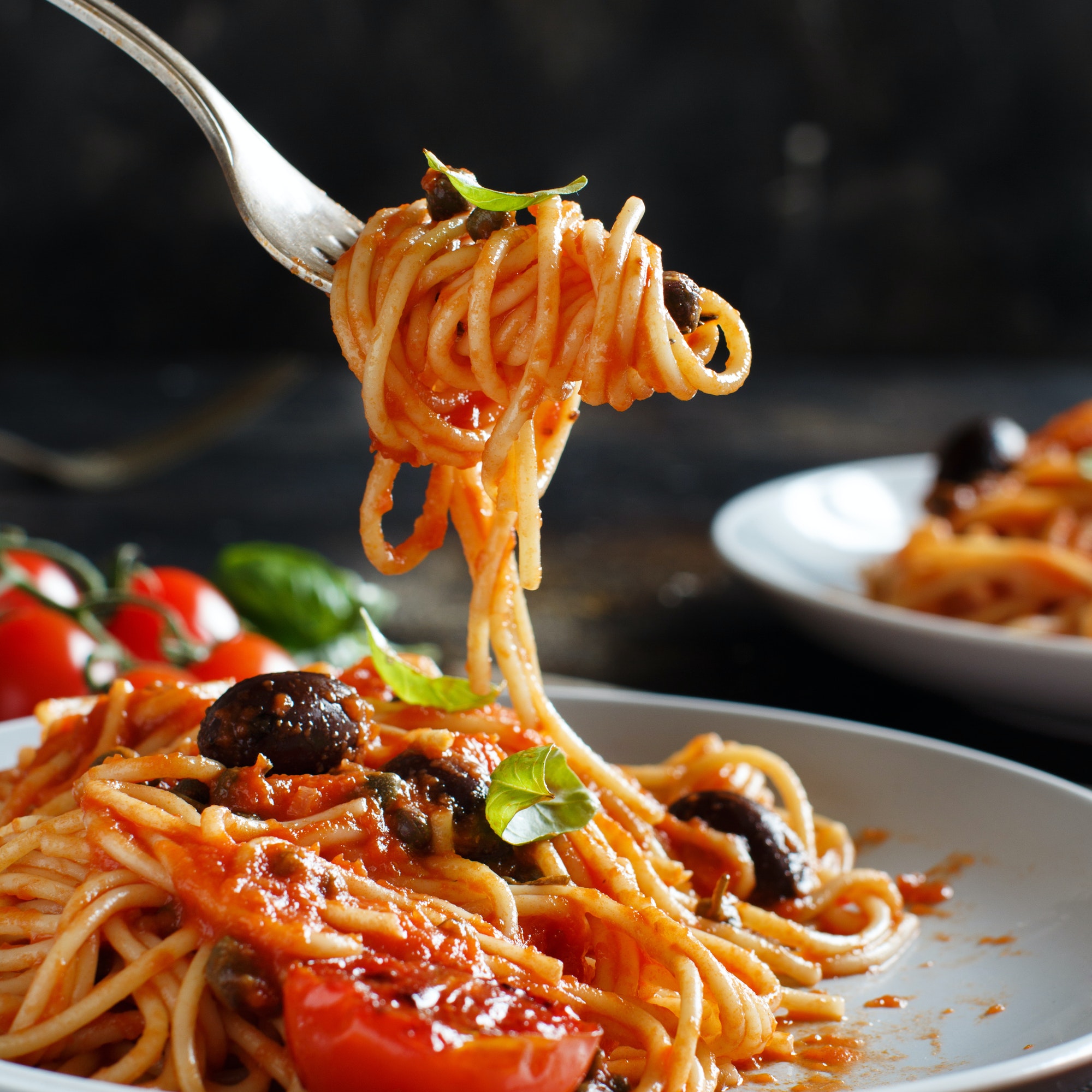 Spaghetti with tomato sauce olives and capers